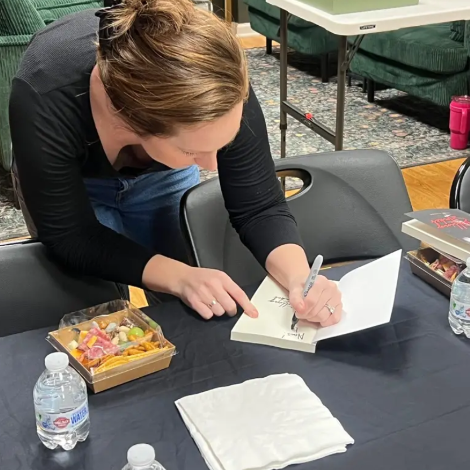 Julia Fisher at a signing event